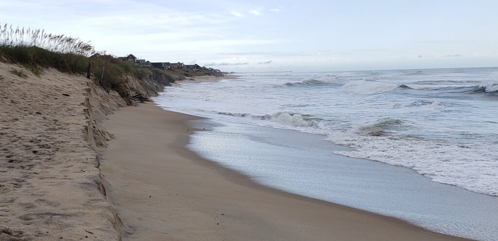 High tide runs right up to the base of the dunes south of Ramp 38, leaving almost no dry sand to drive on.